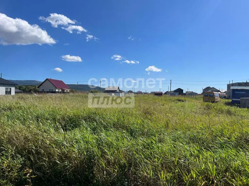 Участок в Сахалинская область, Южно-Сахалинск городской округ, с. ... - Фото 1