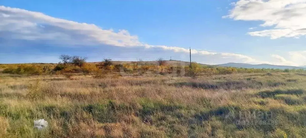 Участок в Крым, Кировский район, Первомайское с/пос, с. Изюмовка ул. ... - Фото 1
