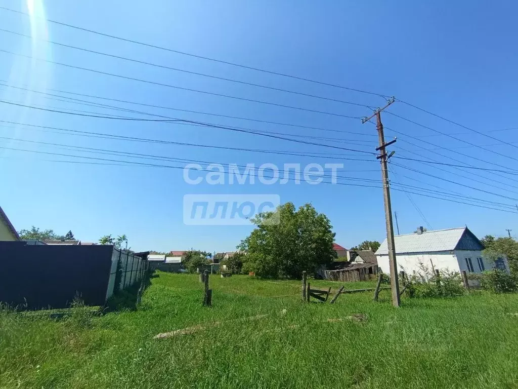 Участок в Краснодарский край, Абинск ул. Коммунаров, 4 (8.0 сот.) - Фото 0