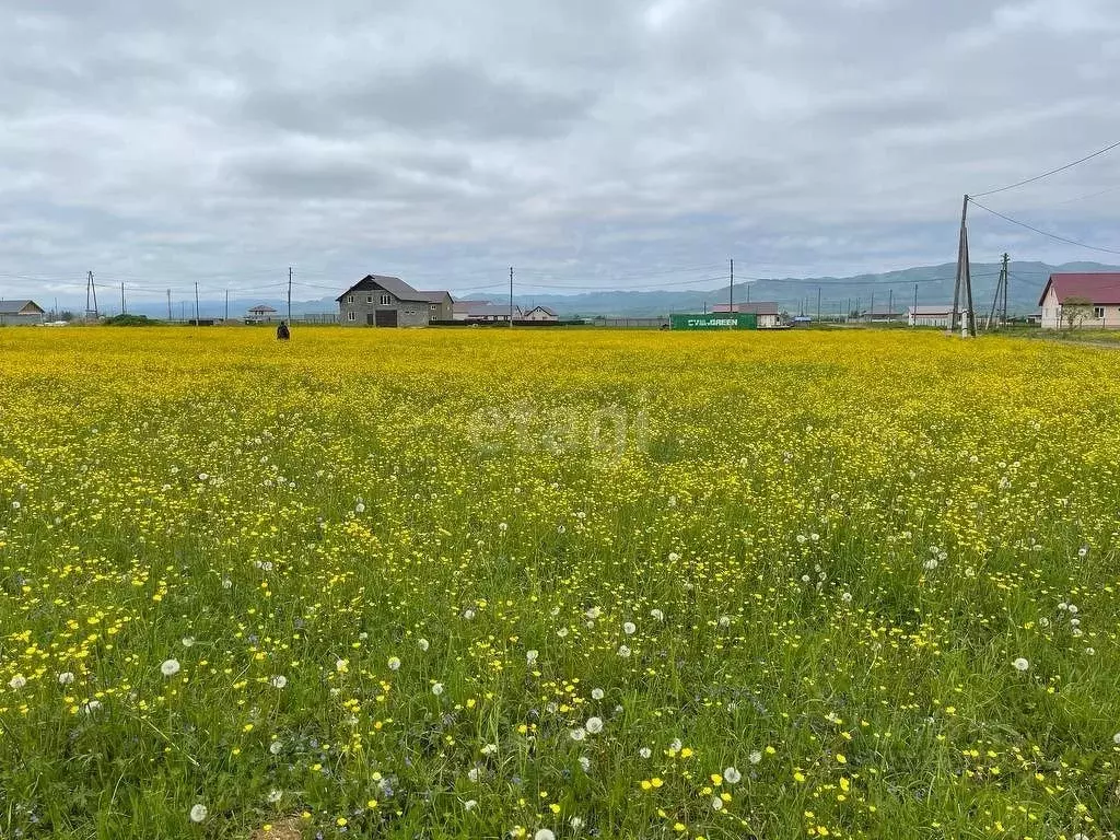 Участок в Сахалинская область, Южно-Сахалинск городской округ, с. ... - Фото 1