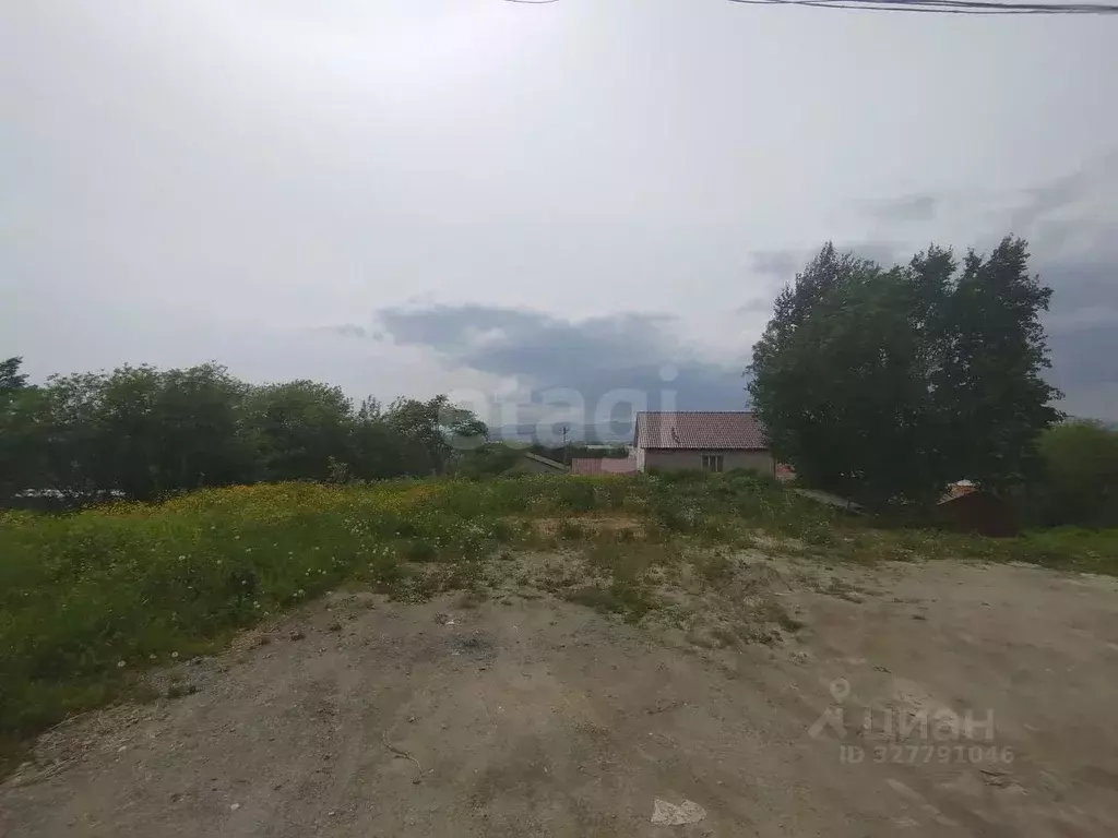 Участок в Сахалинская область, Южно-Сахалинск Комсомольская ул. (700.0 ... - Фото 1