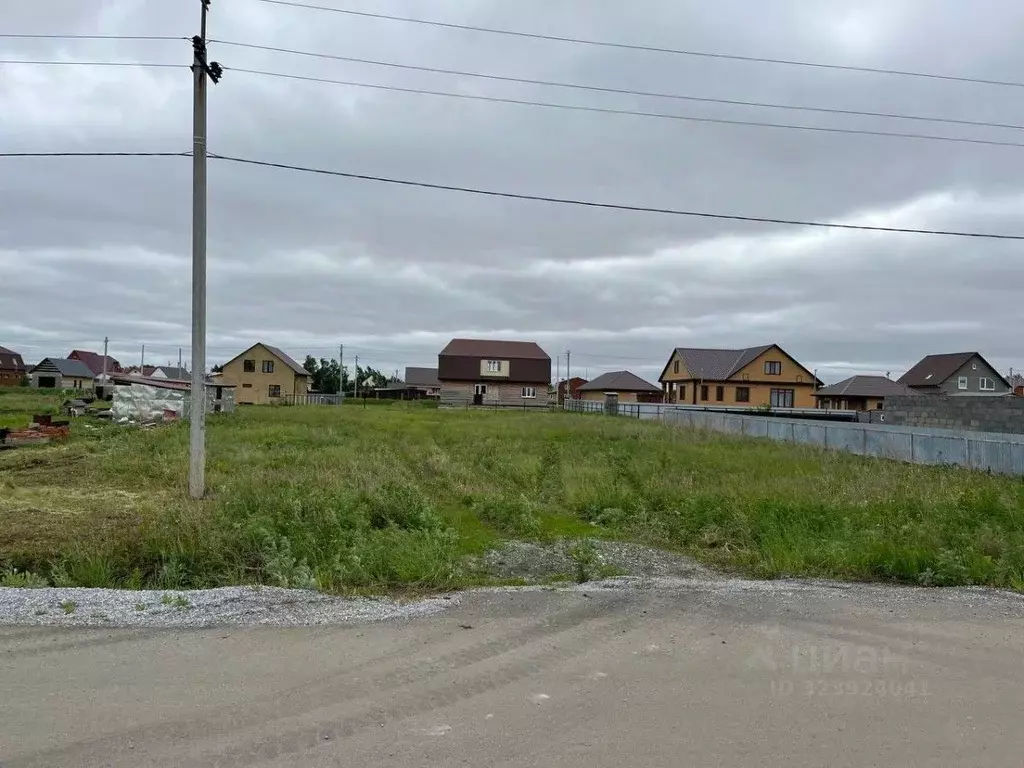 Участок в Омская область, Таврическое рп ул. 2-я Новая (12.0 сот.) - Фото 1