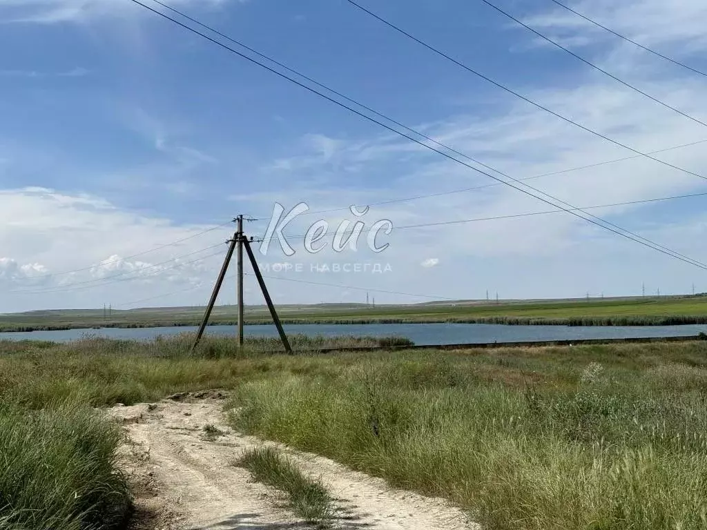 Участок в Крым, Феодосия Колос СПК, ул. Приозерная (7.5 сот.) - Фото 0