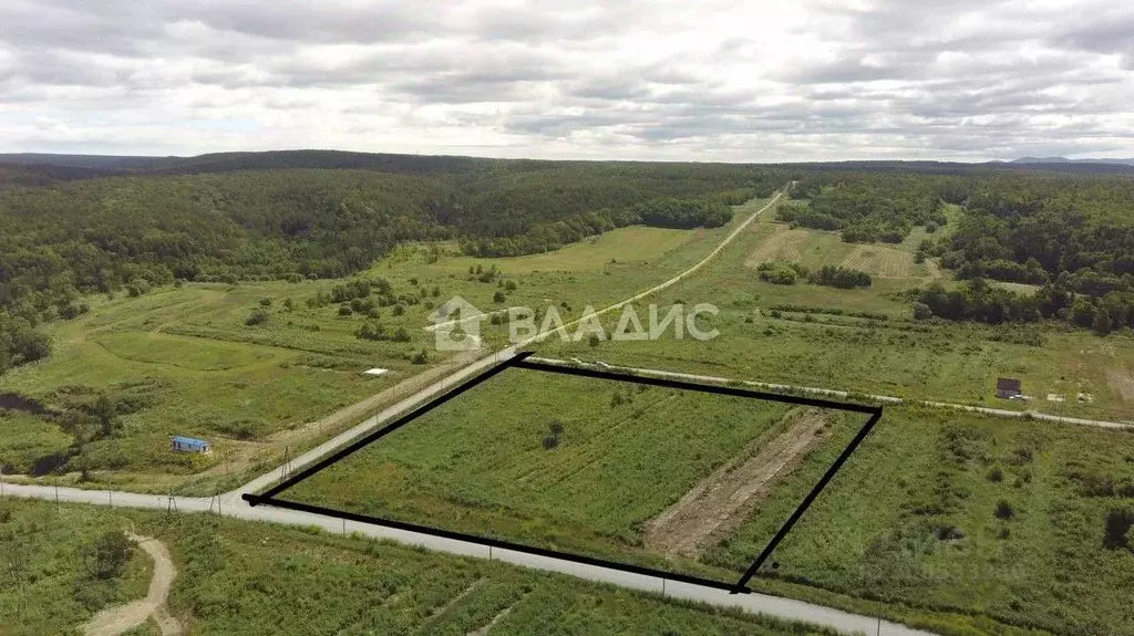 Участок в Сахалинская область, Корсаковский городской округ, с. ... - Фото 0