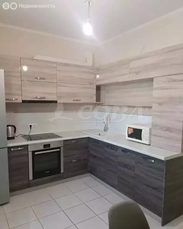 2-комнатная квартира: Тюмень, улица Мельникайте, 138а (52 м) - Фото 1