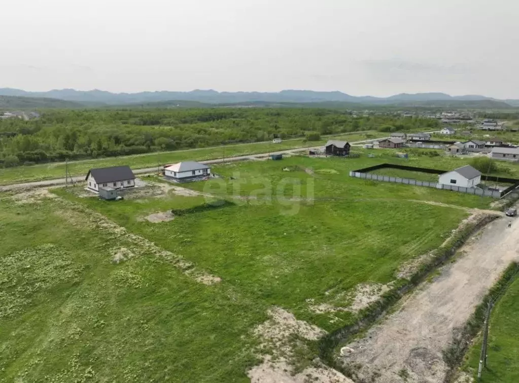 Участок в Сахалинская область, Южно-Сахалинск городской округ, с. ... - Фото 1