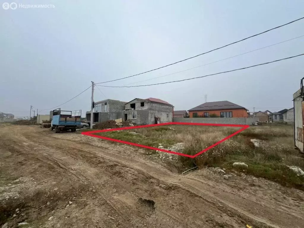 Участок в село Новый Хушет, 3-й микрорайон, улица Адукаева, 38 (6 м) - Фото 1