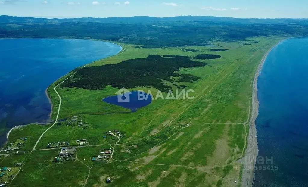 Участок в Сахалинская область, Корсаковский городской округ, с. ... - Фото 1