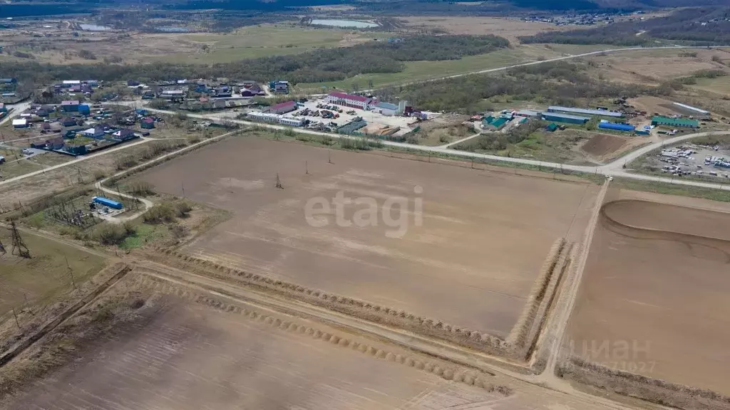 Участок в Сахалинская область, Южно-Сахалинск городской округ, с. ... - Фото 0