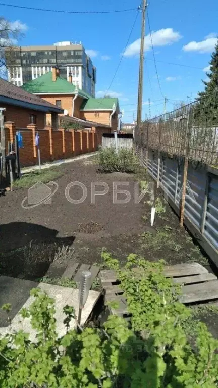 Участок в Тюменская область, Тюмень ул. Коммуны (7.0 сот.) - Фото 0