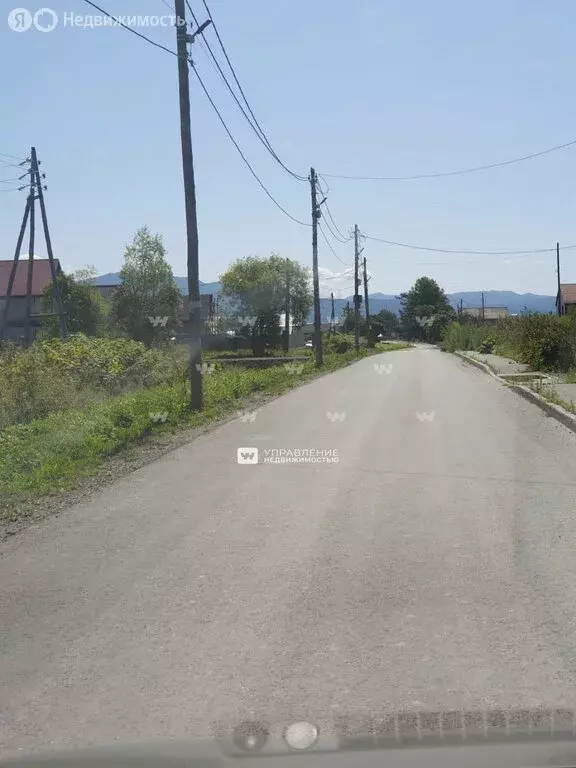 Участок в Сахалинская область, городской округ Южно-Сахалинск, село ... - Фото 0
