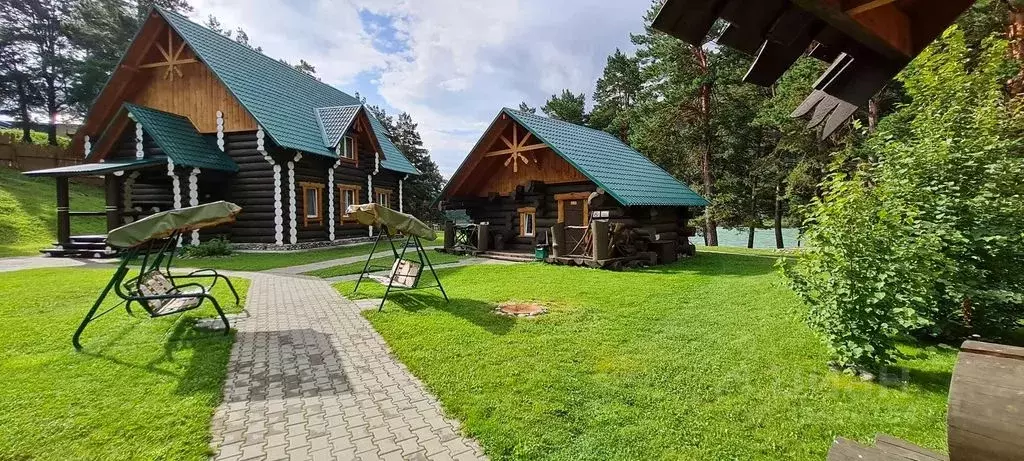 Дом в Алтай, Чемальский район, с. Чемал ул. Прикатунская, 1 (200 м) - Фото 0