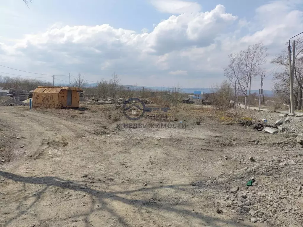 Участок в Сахалинская область, Долинск Комсомольская ул. (10.0 сот.) - Фото 1