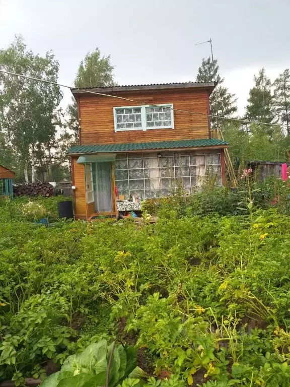 Дом в Саха (Якутия), Якутск городской округ, с. Маган  (50 м) - Фото 0