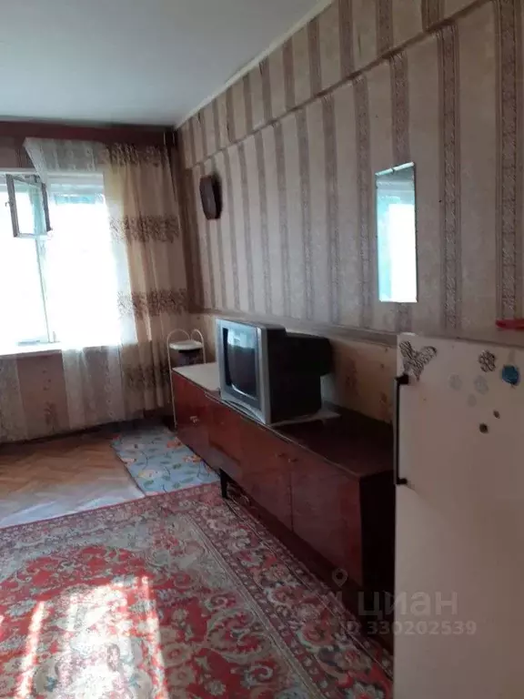 Комната Омская область, Омск ул. 50 лет ВЛКСМ, 4А - Фото 1