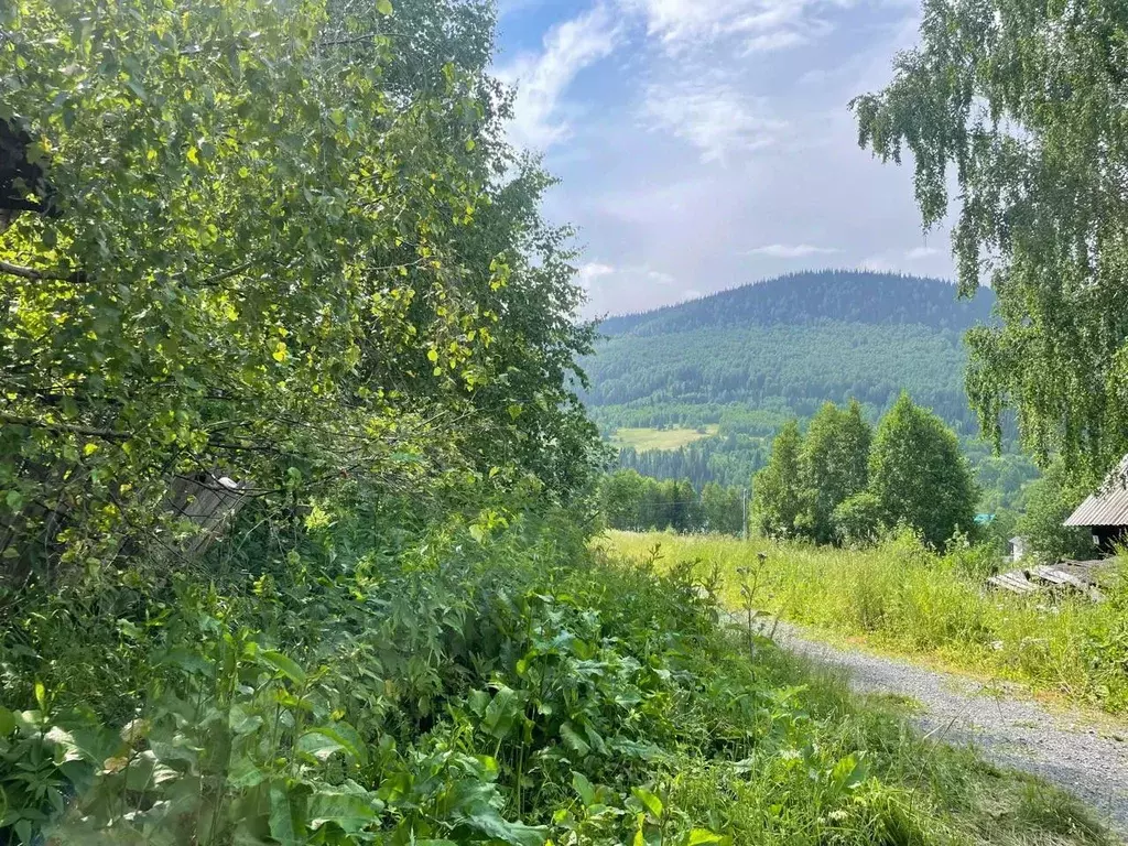 Участок в Кемеровская область, Таштагол ул. Ушакова (8.3 сот.) - Фото 0