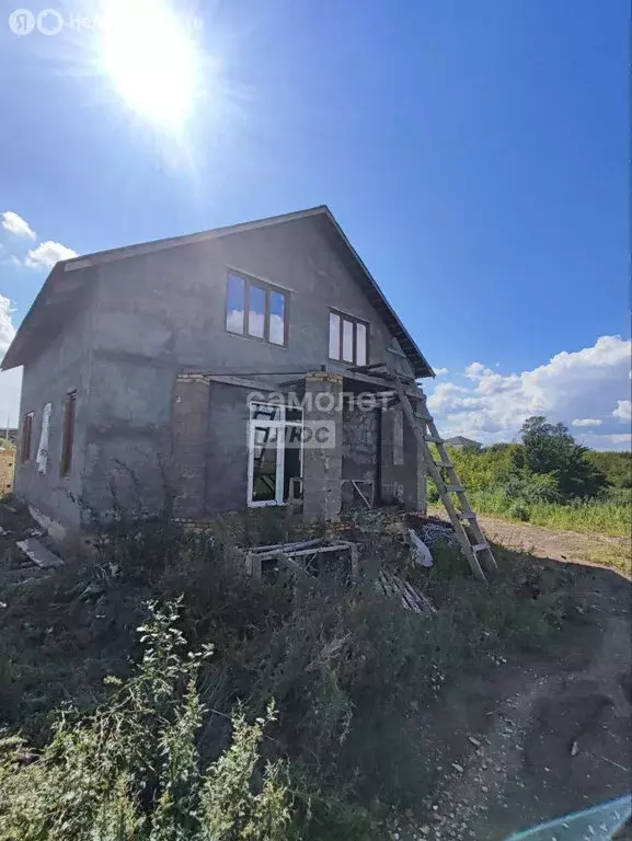Дом в Октябрьский, микрорайон Центр (130 м) - Фото 1